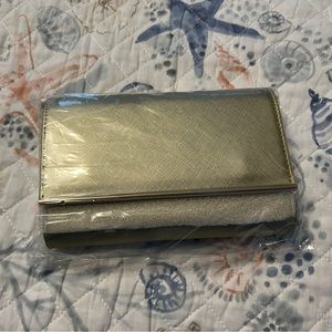 Beautiful Brand new in packaging small crossbody purse with cellphone window